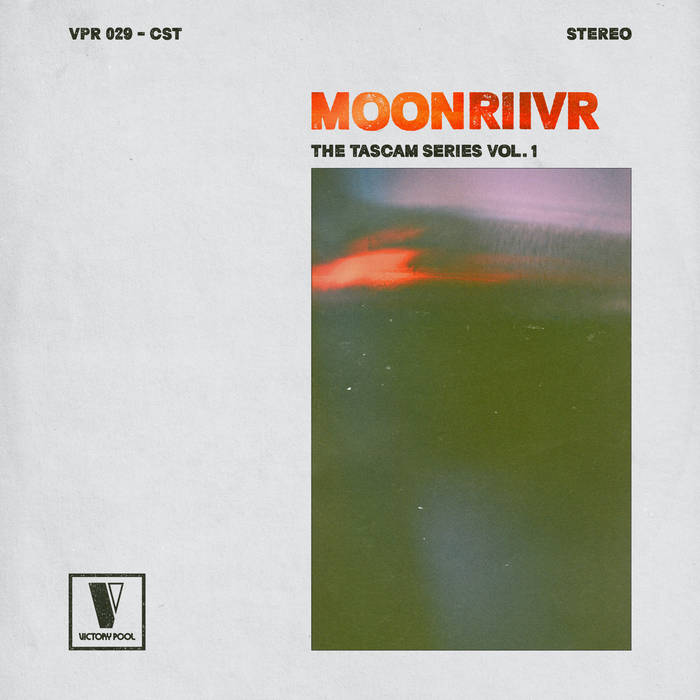 a dark and blurry abstract shape with a bright spot near the left corner